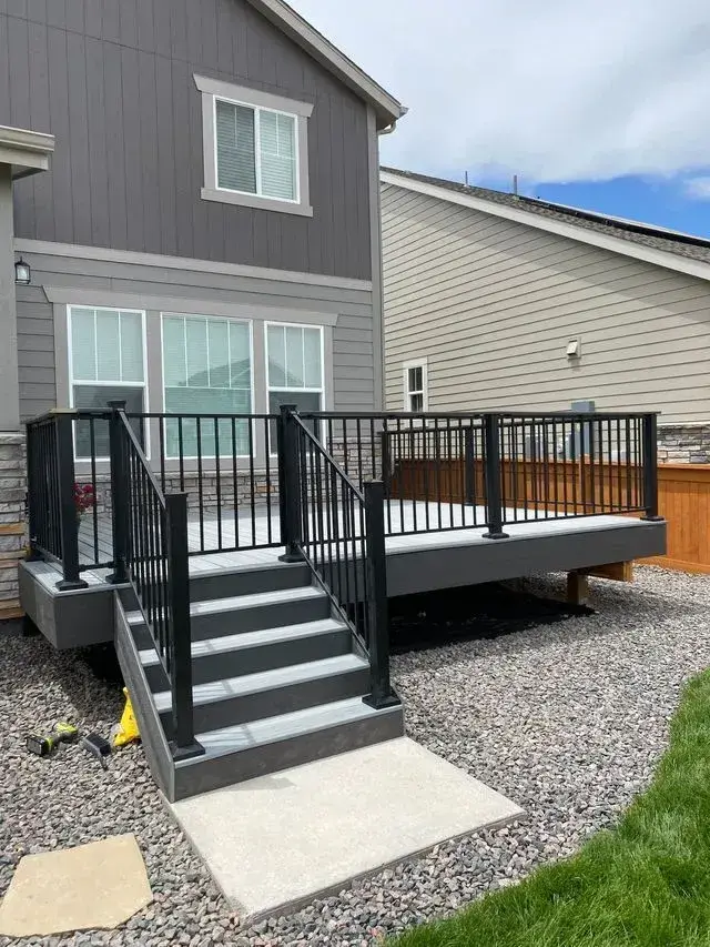 Composite deck boards and railing