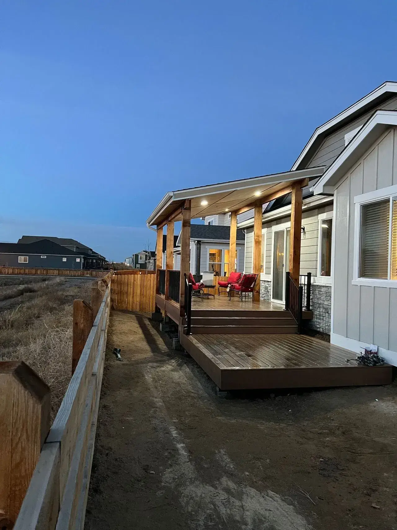 Wood deck with stairs and railing