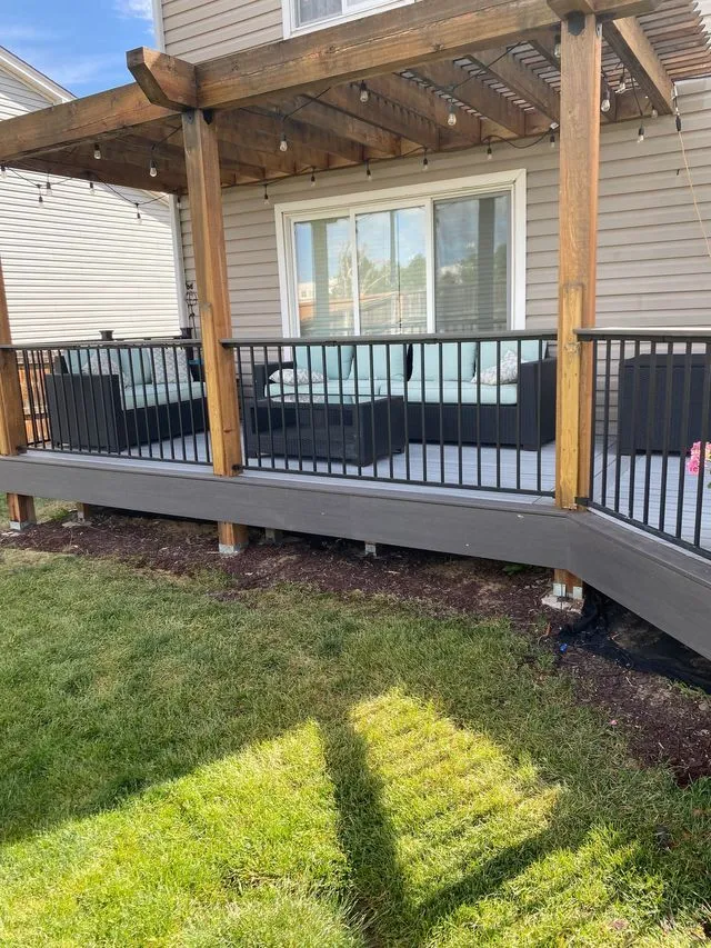 Composite deck with covered patio and railing